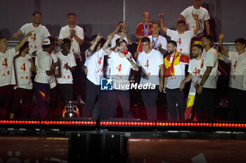 2024-07-15 - Spanish player Marc Cucurella (C) seen celebrating with his teammates during the celebration of the Spanish national football team for the victory of the UEFA Euro 2024 title at Plaza de Cibeles on May 12, 2024 in Madrid, Spain. - SPAIN CELEBRATION UEFA EURO 2024 WIN - UEFA EUROPEAN - SOCCER