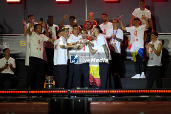 2024-07-15 - Spanish player Marc Cucurella (C) seen celebrating with his teammates during the celebration of the Spanish national football team for the victory of the UEFA Euro 2024 title at Plaza de Cibeles on May 12, 2024 in Madrid, Spain. - SPAIN CELEBRATION UEFA EURO 2024 WIN - UEFA EUROPEAN - SOCCER