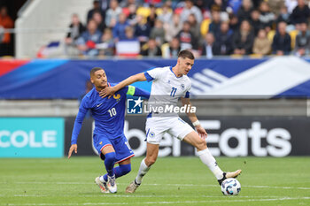 2024-09-10 - Enzo Millot (FRA), Admir Bristric (BOS) during the UEFA Under 21 Championship 2025, Qualifying, Group H football match between France and Bosnia and Herzegovina on 10 September 2024 at MMArena in Le Mans, France - FOOTBALL - UEFA U21 EURO 2025 - QUALIFYING - FRANCE V BOSNIA AND HERZEGOVINA - UEFA EUROPEAN - SOCCER