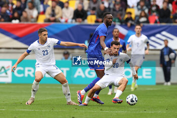 2024-09-10 - Stefan Marcetic (BOS), Chrislain Matsima (FRA), Senad Mustafic (BOS) during the UEFA Under 21 Championship 2025, Qualifying, Group H football match between France and Bosnia and Herzegovina on 10 September 2024 at MMArena in Le Mans, France - FOOTBALL - UEFA U21 EURO 2025 - QUALIFYING - FRANCE V BOSNIA AND HERZEGOVINA - UEFA EUROPEAN - SOCCER