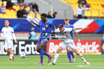 2024-09-10 - Lucien Agoume (FRA), Admir Bristric (BOS) during the UEFA Under 21 Championship 2025, Qualifying, Group H football match between France and Bosnia and Herzegovina on 10 September 2024 at MMArena in Le Mans, France - FOOTBALL - UEFA U21 EURO 2025 - QUALIFYING - FRANCE V BOSNIA AND HERZEGOVINA - UEFA EUROPEAN - SOCCER