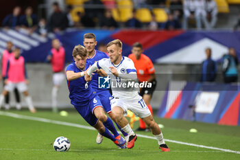 2024-09-10 - Johann Lepenant (FRA), Nail Omerovic (BOS) during the UEFA Under 21 Championship 2025, Qualifying, Group H football match between France and Bosnia and Herzegovina on 10 September 2024 at MMArena in Le Mans, France - FOOTBALL - UEFA U21 EURO 2025 - QUALIFYING - FRANCE V BOSNIA AND HERZEGOVINA - UEFA EUROPEAN - SOCCER