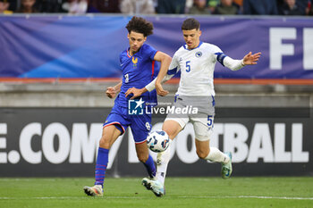 2024-09-10 - Maghnes Akliouche (FRA), Tarik Muharemovic (BOS) during the UEFA Under 21 Championship 2025, Qualifying, Group H football match between France and Bosnia and Herzegovina on 10 September 2024 at MMArena in Le Mans, France - FOOTBALL - UEFA U21 EURO 2025 - QUALIFYING - FRANCE V BOSNIA AND HERZEGOVINA - UEFA EUROPEAN - SOCCER