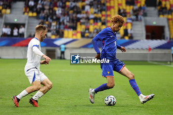 2024-09-10 - Hugo Etikite (FRA), Nail Omerovic (BOS) during the UEFA Under 21 Championship 2025, Qualifying, Group H football match between France and Bosnia and Herzegovina on 10 September 2024 at MMArena in Le Mans, France - FOOTBALL - UEFA U21 EURO 2025 - QUALIFYING - FRANCE V BOSNIA AND HERZEGOVINA - UEFA EUROPEAN - SOCCER