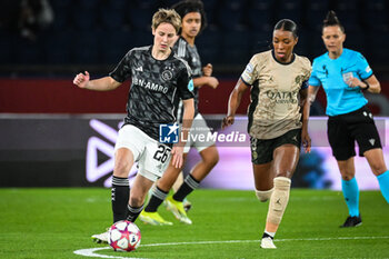 2024-01-24 - Isa KARDINAAL of Amsterdam and Grace GEYORO of PSG during the UEFA Women's Champions League, Group C football match between Paris Saint-Germain and AFC Ajax on January 24, 2024 at Parc des Princes stadium in Paris, France - FOOTBALL - WOMEN'S CHAMPIONS LEAGUE - PARIS SG V AJAX - UEFA CHAMPIONS LEAGUE WOMEN - SOCCER