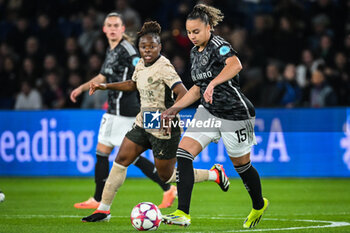2024-01-24 - Sandy BALTIMORE of PSG and Chasity GRANT of Amsterdam during the UEFA Women's Champions League, Group C football match between Paris Saint-Germain and AFC Ajax on January 24, 2024 at Parc des Princes stadium in Paris, France - FOOTBALL - WOMEN'S CHAMPIONS LEAGUE - PARIS SG V AJAX - UEFA CHAMPIONS LEAGUE WOMEN - SOCCER
