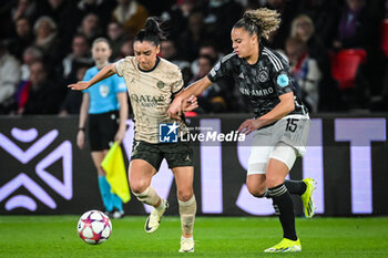 2024-01-24 - Sakina KARCHAOUI of PSG and Chasity GRANT of Amsterdam during the UEFA Women's Champions League, Group C football match between Paris Saint-Germain and AFC Ajax on January 24, 2024 at Parc des Princes stadium in Paris, France - FOOTBALL - WOMEN'S CHAMPIONS LEAGUE - PARIS SG V AJAX - UEFA CHAMPIONS LEAGUE WOMEN - SOCCER