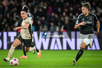 2024-01-24 - Sakina KARCHAOUI of PSG and Chasity GRANT of Amsterdam during the UEFA Women's Champions League, Group C football match between Paris Saint-Germain and AFC Ajax on January 24, 2024 at Parc des Princes stadium in Paris, France - FOOTBALL - WOMEN'S CHAMPIONS LEAGUE - PARIS SG V AJAX - UEFA CHAMPIONS LEAGUE WOMEN - SOCCER
