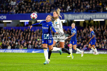2024-01-25 - Johanna Rytting Kaneryd (19) of Chelsea tussles with Caroline Moller (16) of Real Madrid during the UEFA Women's Champions League, Group D football match between Chelsea and Real Madrid on 24 January 2024 at Stamford Bridge in London, England - FOOTBALL - WOMEN'S CHAMPIONS LEAGUE - CHELSEA V REAL MADRID - UEFA CHAMPIONS LEAGUE WOMEN - SOCCER