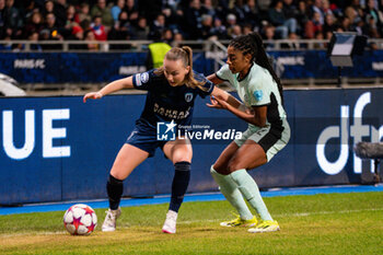 2024-01-30 - Julie Dufour of Paris FC and Ashley Lawrence of Chelsea fight for the ball during the UEFA Women's Champions League, Group D football match between Paris FC and Chelsea on January 30, 2024 at Sebastien Charlety stadium in Paris, France - FOOTBALL - WOMEN'S CHAMPIONS LEAGUE - PARIS FC V CHELSEA - UEFA CHAMPIONS LEAGUE WOMEN - SOCCER