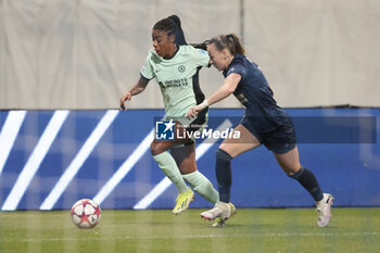 2024-01-30 - Ashley Lawrence of Chelsea, Julie Dufour of Paris FC during the UEFA Women's Champions League, Group D football match between Paris FC and Chelsea on January 30, 2024 at Sebastien Charlety stadium in Paris, France - FOOTBALL - WOMEN'S CHAMPIONS LEAGUE - PARIS FC V CHELSEA - UEFA CHAMPIONS LEAGUE WOMEN - SOCCER