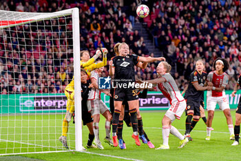 2024-01-30 - Camelia Caesar of AS Roma, Zara Kramzar of AS Roma (will score own goal), Jonna van de Velde of AFC Ajax jumping to hit the ball during the UEFA Women's Champions League, Group C football match between AFC Ajax and AS Roma on January 30, 2024 at Sportpark De Toekomst in Amsterdam-Duivendrecht, Netherlands - FOOTBALL - WOMEN'S CHAMPIONS LEAGUE - AJAX V AS ROMA - UEFA CHAMPIONS LEAGUE WOMEN - SOCCER