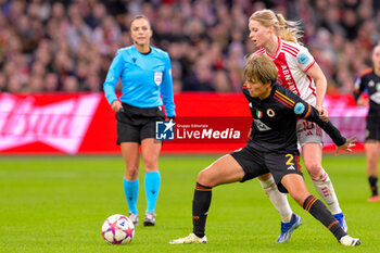 2024-01-30 - Nadine Noordam of AFC Ajax battles for possession with Moeka Minami of AS Roma during the UEFA Women's Champions League, Group C football match between AFC Ajax and AS Roma on January 30, 2024 at Sportpark De Toekomst in Amsterdam-Duivendrecht, Netherlands - FOOTBALL - WOMEN'S CHAMPIONS LEAGUE - AJAX V AS ROMA - UEFA CHAMPIONS LEAGUE WOMEN - SOCCER