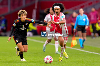 2024-01-30 - Moeka Minami of AS Roma battles for possession with Lily Yohannes of AFC Ajax during the UEFA Women's Champions League, Group C football match between AFC Ajax and AS Roma on January 30, 2024 at Sportpark De Toekomst in Amsterdam-Duivendrecht, Netherlands - FOOTBALL - WOMEN'S CHAMPIONS LEAGUE - AJAX V AS ROMA - UEFA CHAMPIONS LEAGUE WOMEN - SOCCER