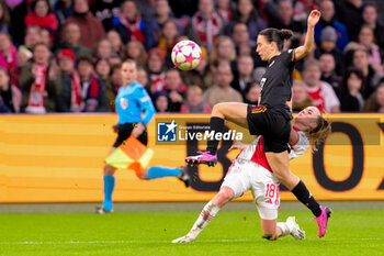 2024-01-30 - Milicia Keijzer of AFC Ajax battles for possession with Lucia Di Guglielmo of AS Roma during the UEFA Women's Champions League, Group C football match between AFC Ajax and AS Roma on January 30, 2024 at Sportpark De Toekomst in Amsterdam-Duivendrecht, Netherlands - FOOTBALL - WOMEN'S CHAMPIONS LEAGUE - AJAX V AS ROMA - UEFA CHAMPIONS LEAGUE WOMEN - SOCCER