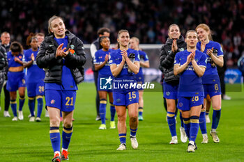 2024-03-19 - Niamh Charles, Eve Perisset, Jelena Cankovic and Sjoeke Nusken of Chelsea celebrate the win during the UEFA Women's Champions League, Quarter-finals, 1st leg football match between AFC Ajax and Chelsea FC on March 19, 2024 at Johan Cruijff ArenA in Amsterdam, Netherlands - FOOTBALL - WOMEN'S CHAMPIONS LEAGUE - AJAX V CHELSEA - UEFA CHAMPIONS LEAGUE WOMEN - SOCCER