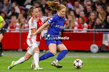 2024-03-19 - Sjoeke Nusken of Chelsea is challenged by Rosa van Gool of AFC Ajax during the UEFA Women's Champions League, Quarter-finals, 1st leg football match between AFC Ajax and Chelsea FC on March 19, 2024 at Johan Cruijff ArenA in Amsterdam, Netherlands - FOOTBALL - WOMEN'S CHAMPIONS LEAGUE - AJAX V CHELSEA - UEFA CHAMPIONS LEAGUE WOMEN - SOCCER