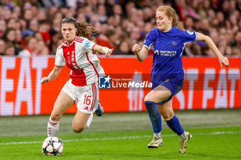 2024-03-19 - Danique Noordman of AFC Ajax is challenged by Melanie Leupolz of Chelsea during the UEFA Women's Champions League, Quarter-finals, 1st leg football match between AFC Ajax and Chelsea FC on March 19, 2024 at Johan Cruijff ArenA in Amsterdam, Netherlands - FOOTBALL - WOMEN'S CHAMPIONS LEAGUE - AJAX V CHELSEA - UEFA CHAMPIONS LEAGUE WOMEN - SOCCER