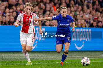 2024-03-19 - Jonna van de Velde of AFC Ajax battles for the ball with Niamh Charles of Chelsea during the UEFA Women's Champions League, Quarter-finals, 1st leg football match between AFC Ajax and Chelsea FC on March 19, 2024 at Johan Cruijff ArenA in Amsterdam, Netherlands - FOOTBALL - WOMEN'S CHAMPIONS LEAGUE - AJAX V CHELSEA - UEFA CHAMPIONS LEAGUE WOMEN - SOCCER