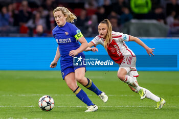 2024-03-19 - Erin Cuthbert of Chelsea is challenged by Rosa van Gool of AFC Ajax during the UEFA Women's Champions League, Quarter-finals, 1st leg football match between AFC Ajax and Chelsea FC on March 19, 2024 at Johan Cruijff ArenA in Amsterdam, Netherlands - FOOTBALL - WOMEN'S CHAMPIONS LEAGUE - AJAX V CHELSEA - UEFA CHAMPIONS LEAGUE WOMEN - SOCCER