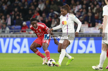 2024-03-27 - Kadidiatou DIANI of Lyon and Christy UCHEIBE of Benfica during the UEFA Women's Champions League, Quarter-finals, 2nd leg football match between Olympique Lyonnais and SL Benfica on March 27, 2024 at Groupama stadium in Decines-Charpieu near Lyon, France - FOOTBALL - WOMEN'S CHAMPIONS LEAGUE - LYON V BENFICA - UEFA CHAMPIONS LEAGUE WOMEN - SOCCER