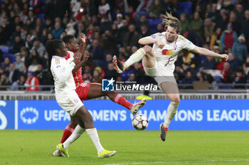 2024-03-27 - Vanessa GILLES of Lyon and Griedge MBOCK BATHY of Lyon and Andreia FARIA of Benfica during the UEFA Women's Champions League, Quarter-finals, 2nd leg football match between Olympique Lyonnais and SL Benfica on March 27, 2024 at Groupama stadium in Decines-Charpieu near Lyon, France - FOOTBALL - WOMEN'S CHAMPIONS LEAGUE - LYON V BENFICA - UEFA CHAMPIONS LEAGUE WOMEN - SOCCER