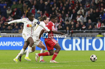 2024-03-27 - Andreia FARIA of Benfica and Griedge MBOCK BATHY of Lyon and Vanessa GILLES of Lyon during the UEFA Women's Champions League, Quarter-finals, 2nd leg football match between Olympique Lyonnais and SL Benfica on March 27, 2024 at Groupama stadium in Decines-Charpieu near Lyon, France - FOOTBALL - WOMEN'S CHAMPIONS LEAGUE - LYON V BENFICA - UEFA CHAMPIONS LEAGUE WOMEN - SOCCER