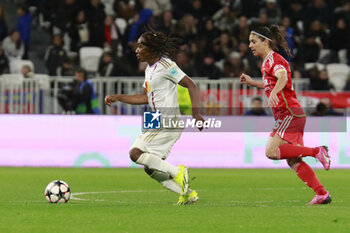2024-03-27 - Melchie DUMORNAY of Lyon and Carole COSTA of Benfica during the UEFA Women's Champions League, Quarter-finals, 2nd leg football match between Olympique Lyonnais and SL Benfica on March 27, 2024 at Groupama stadium in Decines-Charpieu near Lyon, France - FOOTBALL - WOMEN'S CHAMPIONS LEAGUE - LYON V BENFICA - UEFA CHAMPIONS LEAGUE WOMEN - SOCCER