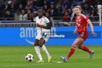 2024-03-27 - Griedge MBOCK BATHY of Lyon and Chandra DAVIDSON of Benfica during the UEFA Women's Champions League, Quarter-finals, 2nd leg football match between Olympique Lyonnais and SL Benfica on March 27, 2024 at Groupama stadium in Decines-Charpieu near Lyon, France - FOOTBALL - WOMEN'S CHAMPIONS LEAGUE - LYON V BENFICA - UEFA CHAMPIONS LEAGUE WOMEN - SOCCER