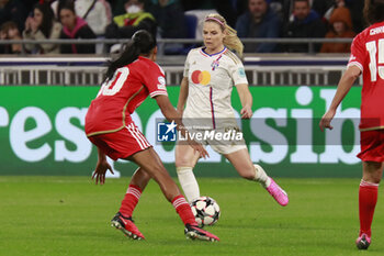 2024-03-27 - Eugénie LE SOMMER of Lyon and Lais ARAUJO of Benfica during the UEFA Women's Champions League, Quarter-finals, 2nd leg football match between Olympique Lyonnais and SL Benfica on March 27, 2024 at Groupama stadium in Decines-Charpieu near Lyon, France - FOOTBALL - WOMEN'S CHAMPIONS LEAGUE - LYON V BENFICA - UEFA CHAMPIONS LEAGUE WOMEN - SOCCER