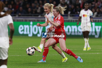 2024-03-27 - Lindsey HORAN of Lyon and Chandra DAVIDSON of Benfica during the UEFA Women's Champions League, Quarter-finals, 2nd leg football match between Olympique Lyonnais and SL Benfica on March 27, 2024 at Groupama stadium in Decines-Charpieu near Lyon, France - FOOTBALL - WOMEN'S CHAMPIONS LEAGUE - LYON V BENFICA - UEFA CHAMPIONS LEAGUE WOMEN - SOCCER