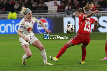 2024-03-27 - Ellie CARPENTER of Lyon and Lucia ALVES of Benfica during the UEFA Women's Champions League, Quarter-finals, 2nd leg football match between Olympique Lyonnais and SL Benfica on March 27, 2024 at Groupama stadium in Decines-Charpieu near Lyon, France - FOOTBALL - WOMEN'S CHAMPIONS LEAGUE - LYON V BENFICA - UEFA CHAMPIONS LEAGUE WOMEN - SOCCER