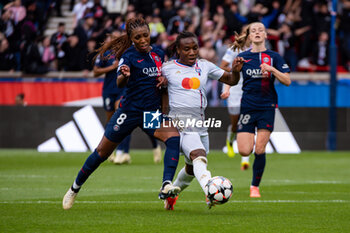 2024-04-28 - Grace Geyoro of Paris Saint Germain and Melchie Dumornay of Olympique Lyonnais fight for the ball during the UEFA Women's Champions League, Semi-finals, 2nd leg football match between Paris Saint-Germain and Olympique Lyonnais on April 28, 2024 at Parc des Princes stadium in Paris, France - FOOTBALL - WOMEN'S CHAMPIONS LEAGUE - PARIS SG V LYON - UEFA CHAMPIONS LEAGUE WOMEN - SOCCER