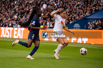 2024-04-28 - Thiniba Samoura of Paris Saint Germain and Delphine Cascarino of Olympique Lyonnais fight for the ball during the UEFA Women's Champions League, Semi-finals, 2nd leg football match between Paris Saint-Germain and Olympique Lyonnais on April 28, 2024 at Parc des Princes stadium in Paris, France - FOOTBALL - WOMEN'S CHAMPIONS LEAGUE - PARIS SG V LYON - UEFA CHAMPIONS LEAGUE WOMEN - SOCCER