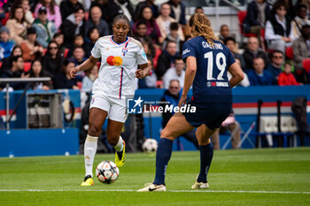 2024-04-28 - Kadidiatou Diani of Olympique Lyonnais and Eva Gaetino of Paris Saint Germain fight for the ball during the UEFA Women's Champions League, Semi-finals, 2nd leg football match between Paris Saint-Germain and Olympique Lyonnais on April 28, 2024 at Parc des Princes stadium in Paris, France - FOOTBALL - WOMEN'S CHAMPIONS LEAGUE - PARIS SG V LYON - UEFA CHAMPIONS LEAGUE WOMEN - SOCCER