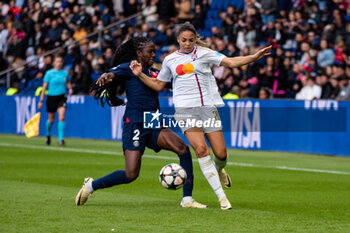 2024-04-28 - Thiniba Samoura of Paris Saint Germain and Delphine Cascarino of Olympique Lyonnais fight for the ball during the UEFA Women's Champions League, Semi-finals, 2nd leg football match between Paris Saint-Germain and Olympique Lyonnais on April 28, 2024 at Parc des Princes stadium in Paris, France - FOOTBALL - WOMEN'S CHAMPIONS LEAGUE - PARIS SG V LYON - UEFA CHAMPIONS LEAGUE WOMEN - SOCCER