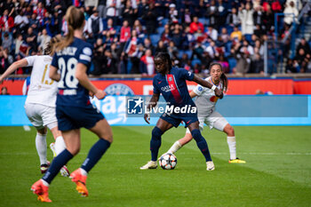 2024-04-28 - Tabitha Chawinga of Paris Saint Germain and Selma Bacha of Olympique Lyonnais fight for the ball during the UEFA Women's Champions League, Semi-finals, 2nd leg football match between Paris Saint-Germain and Olympique Lyonnais on April 28, 2024 at Parc des Princes stadium in Paris, France - FOOTBALL - WOMEN'S CHAMPIONS LEAGUE - PARIS SG V LYON - UEFA CHAMPIONS LEAGUE WOMEN - SOCCER