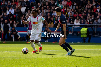 2024-04-28 - Melchie Dumornay of Olympique Lyonnais and Elisa De Almeida of Paris Saint Germain fight for the ball during the UEFA Women's Champions League, Semi-finals, 2nd leg football match between Paris Saint-Germain and Olympique Lyonnais on April 28, 2024 at Parc des Princes stadium in Paris, France - FOOTBALL - WOMEN'S CHAMPIONS LEAGUE - PARIS SG V LYON - UEFA CHAMPIONS LEAGUE WOMEN - SOCCER