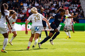 2024-04-28 - Lindsey Horan of Olympique Lyonnais and Grace Geyoro of Paris Saint Germain fight for the ball during the UEFA Women's Champions League, Semi-finals, 2nd leg football match between Paris Saint-Germain and Olympique Lyonnais on April 28, 2024 at Parc des Princes stadium in Paris, France - FOOTBALL - WOMEN'S CHAMPIONS LEAGUE - PARIS SG V LYON - UEFA CHAMPIONS LEAGUE WOMEN - SOCCER