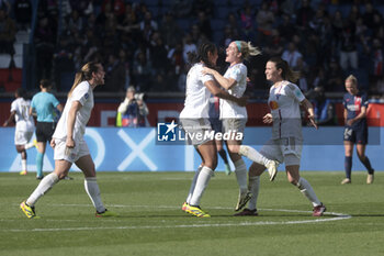 2024-04-28 - Vanessa Gilles, Wendie Renard, Ellie Carpenter, Damaris Egurrola Wienke of Lyon celebrate the second goal for Lyon during the UEFA Women's Champions League, Semi-finals, 2nd leg football match between Paris Saint-Germain and Olympique Lyonnais on April 28, 2024 at Parc des Princes stadium in Paris, France - FOOTBALL - WOMEN'S CHAMPIONS LEAGUE - PARIS SG V LYON - UEFA CHAMPIONS LEAGUE WOMEN - SOCCER