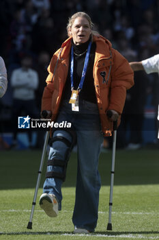 2024-04-28 - Eugenie Le Sommer of Lyon with crutches celebrates the victory following the UEFA Women's Champions League, Semi-finals, 2nd leg football match between Paris Saint-Germain and Olympique Lyonnais on April 28, 2024 at Parc des Princes stadium in Paris, France - FOOTBALL - WOMEN'S CHAMPIONS LEAGUE - PARIS SG V LYON - UEFA CHAMPIONS LEAGUE WOMEN - SOCCER