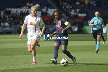 2024-04-28 - Grace Geyoro of PSG, left Lindsey Horan of Lyon during the UEFA Women's Champions League, Semi-finals, 2nd leg football match between Paris Saint-Germain and Olympique Lyonnais on April 28, 2024 at Parc des Princes stadium in Paris, France - FOOTBALL - WOMEN'S CHAMPIONS LEAGUE - PARIS SG V LYON - UEFA CHAMPIONS LEAGUE WOMEN - SOCCER