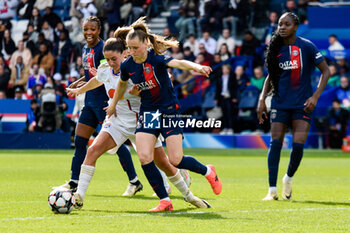 2024-04-28 - Danielle Van De Donk of Olympique Lyonnais and Jade Le Guilly of Paris Saint Germain fight for the ball during the UEFA Women's Champions League, Semi-finals, 2nd leg football match between Paris Saint-Germain and Olympique Lyonnais on April 28, 2024 at Parc des Princes stadium in Paris, France - FOOTBALL - WOMEN'S CHAMPIONS LEAGUE - PARIS SG V LYON - UEFA CHAMPIONS LEAGUE WOMEN - SOCCER