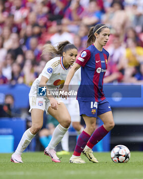 2024-05-25 - Aitana Bonmati of FC Barcelona competes for the ball with Delphine Cascarino of Olympique Lyonnais during the UEFA Women's Champions League, Final, football match between FC Barcelona and Olympique Lyonnais on May 25, 2024 at San Mames stadium in Bilbao, Spain - FOOTBALL - WOMEN'S CHAMPIONS LEAGUE - FINAL - FC BARCELONA V LYON - UEFA CHAMPIONS LEAGUE WOMEN - SOCCER