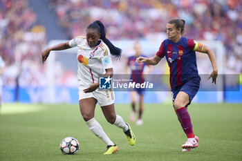 2024-05-25 - Kadidiatou Diani of Olympique Lyonnais competes for the ball with Patri Guijarro of FC Barcelona during the UEFA Women's Champions League, Final, football match between FC Barcelona and Olympique Lyonnais on May 25, 2024 at San Mames stadium in Bilbao, Spain - FOOTBALL - WOMEN'S CHAMPIONS LEAGUE - FINAL - FC BARCELONA V LYON - UEFA CHAMPIONS LEAGUE WOMEN - SOCCER