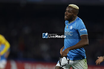 2024-02-21 - SSC Napoli's Nigerian forward Victor Osimhen celebrates after scoring a goal during the UEFA Champions League round 16 match between SSC Napoli vs Barcellona at the Diego Armando Maradona Stadium in Naples, southern Italy, on February 21, 2024. - SSC NAPOLI VS FC BARCELONA - UEFA CHAMPIONS LEAGUE - SOCCER