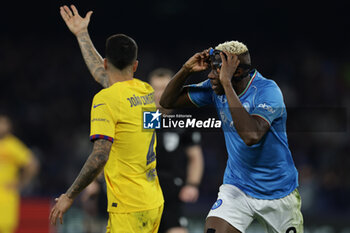 2024-02-21 - SSC Napoli's Nigerian forward Victor Osimhen celebrates after scoring a goal during the UEFA Champions League round 16 match between SSC Napoli vs Barcellona at the Diego Armando Maradona Stadium in Naples, southern Italy, on February 21, 2024. - SSC NAPOLI VS FC BARCELONA - UEFA CHAMPIONS LEAGUE - SOCCER