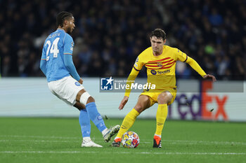 2024-02-21 - SSC Napoli's Swedish midfielder Jens-Lys Michel Cajuste challenges for the ball with Barcellona's Danish defender Andreas Christensen during the UEFA Champions League round 16 match between SSC Napoli vs Barcellona at the Diego Armando Maradona Stadium in Naples, southern Italy, on February 21, 2024. - SSC NAPOLI VS FC BARCELONA - UEFA CHAMPIONS LEAGUE - SOCCER