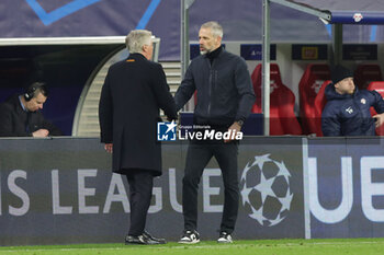 2024-02-13 - Coach Carlo Ancelotti of Real Madrid and Coach Marco Rose of RB Leipzig during the UEFA Champions League, Round of 16 1st leg football match between Red Bull Leipzig and Real Madrid on February 13, 2024 at Red Bull Arena in Leipzig, Germany - FOOTBALL - CHAMPIONS LEAGUE - RB LEIPZIG V REAL MADRID - UEFA CHAMPIONS LEAGUE - SOCCER