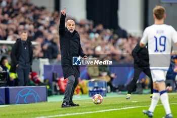 2024-02-14 - Pep Guardiola Manager of Manchester City during the UEFA Champions League, Round of 16 1st leg football match between FC Copenhagen and Manchester City on 13 February 2024 at Parken Stadium in Copenhagen, Denmark - FOOTBALL - CHAMPIONS LEAGUE - COPENHAGEN V MANCHESTER CITY - UEFA CHAMPIONS LEAGUE - SOCCER